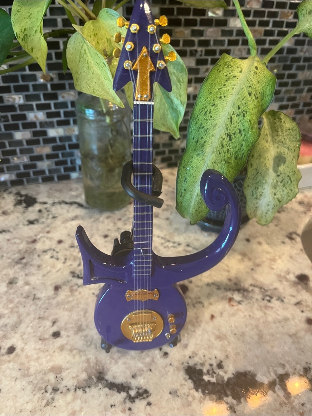 Glossy Purple Spiral-Body Guitar Figurine with Gold Hardware